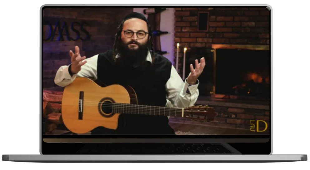 The guitar academy lessons on a laptop